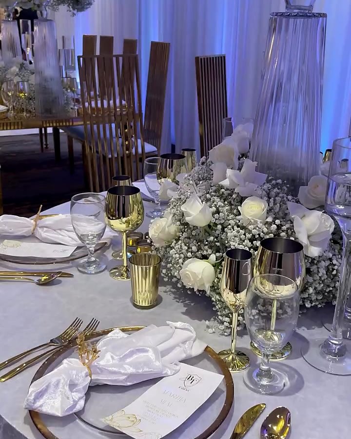 Wedding place setting with gold charger, gold flatware, velvet napkin and printed menu by Sharp Designs